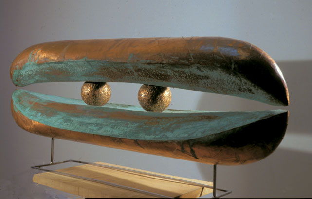“Ancient Vessel”, 1990, Walnut carving covered with copper and patina